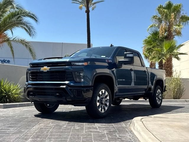 2026 Chevrolet Silverado 2500 HD Custom in Lakeshore Blue Metallic — front three-quarter view