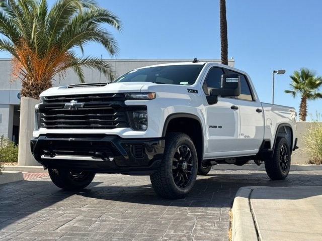 2026 Chevrolet Silverado 2500 HD Custom in Summit White — front three-quarter view