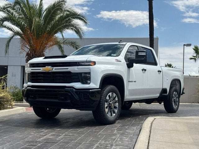 2026 Chevrolet Silverado 2500 HD Custom in Summit White — front three-quarter view