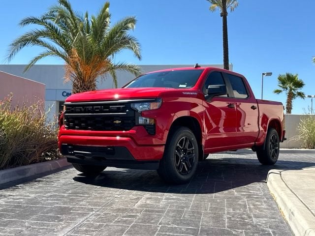 2026 Chevrolet Silverado 1500 Custom in Red Hot — front three-quarter view