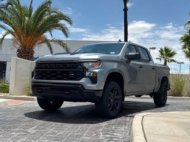 2026 Chevrolet Silverado 1500 Custom Trail Boss in Sterling Gray Metallic — front three-quarter view