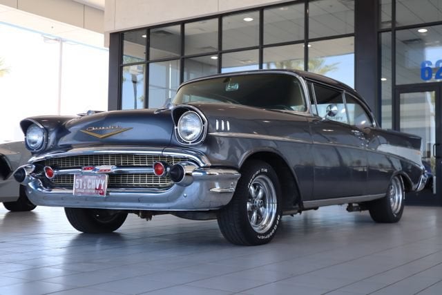 1957 CHEV BELA NA in Gray — front three-quarter view